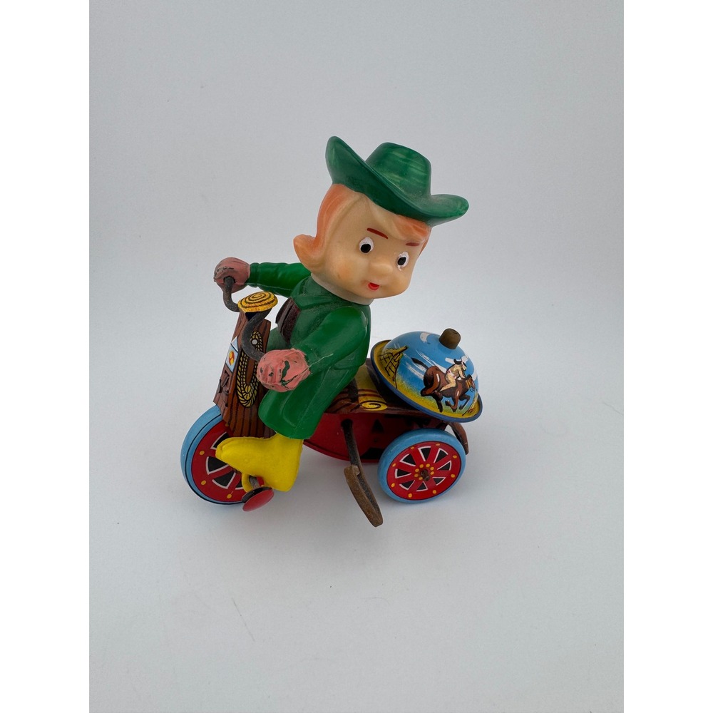 Vintage Louis Marx Tin Wind Up Toy Cowboy Girl Riding Tricycle Made in Japan‎
